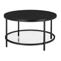 Table basse ronde en marbre noir et métal noir.