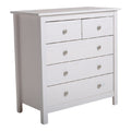 Commode blanche avec cinq tiroirs en bois.