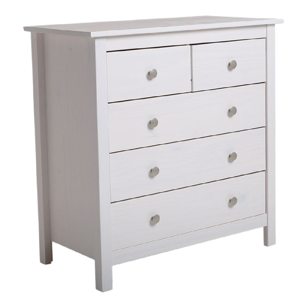 Commode blanche avec cinq tiroirs en bois.